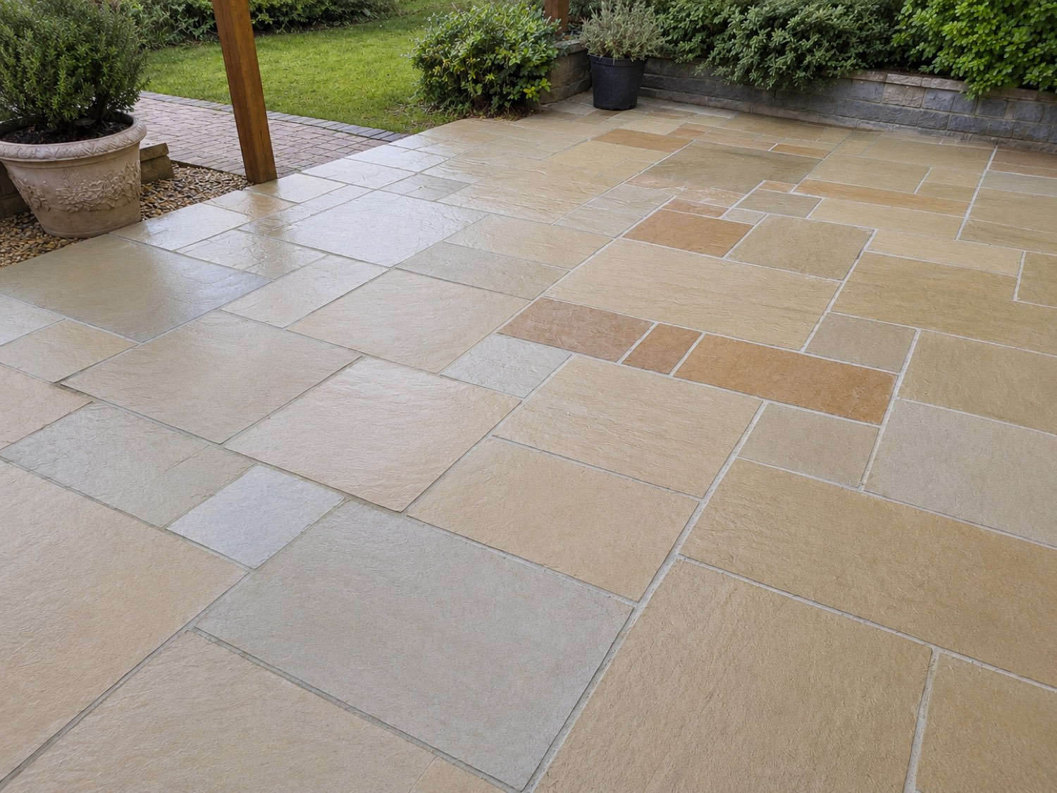 The same patio after cleaning — restored sandstone