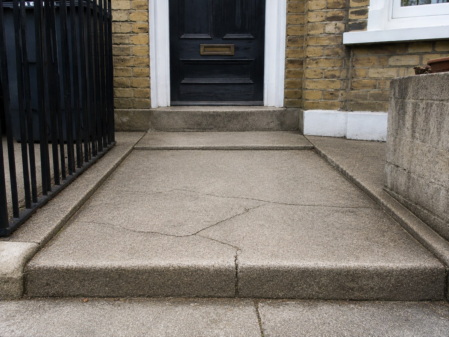 The same path after weed removal — clear and tidy